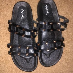 Black slip on sandals with gold studs still have